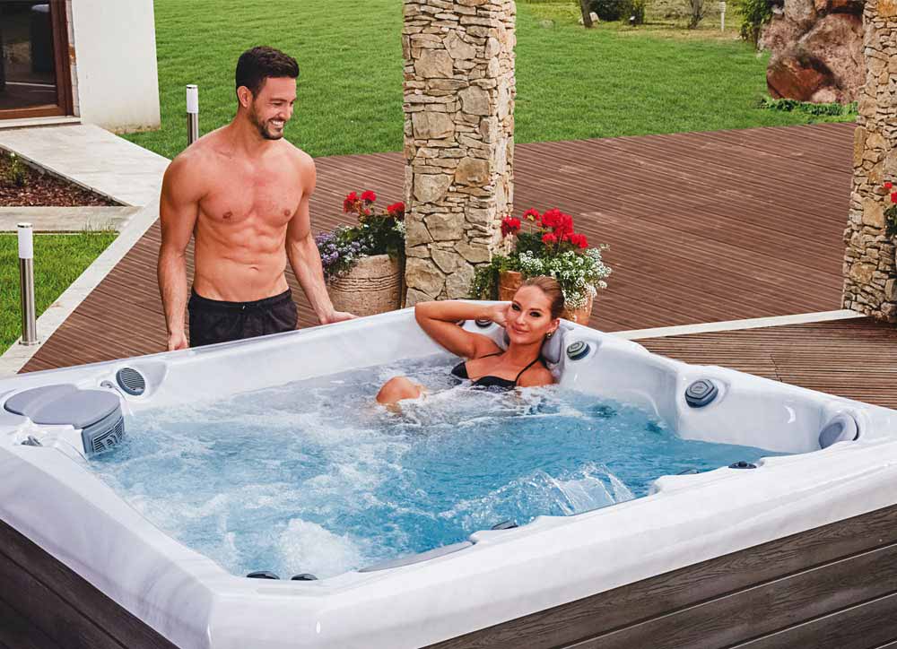 Bath water cleaning dosing systems